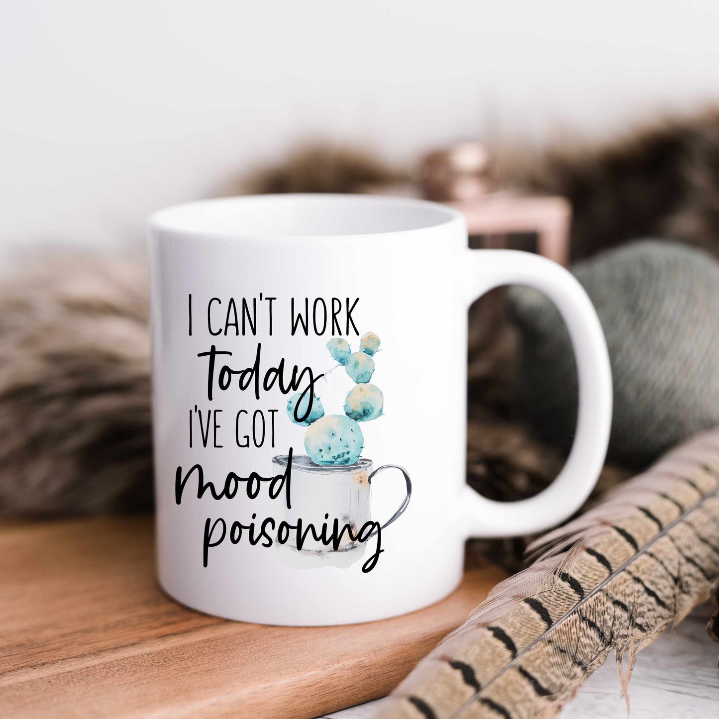 Funny office mug that reads I can't work today I've got mood poisoning.
