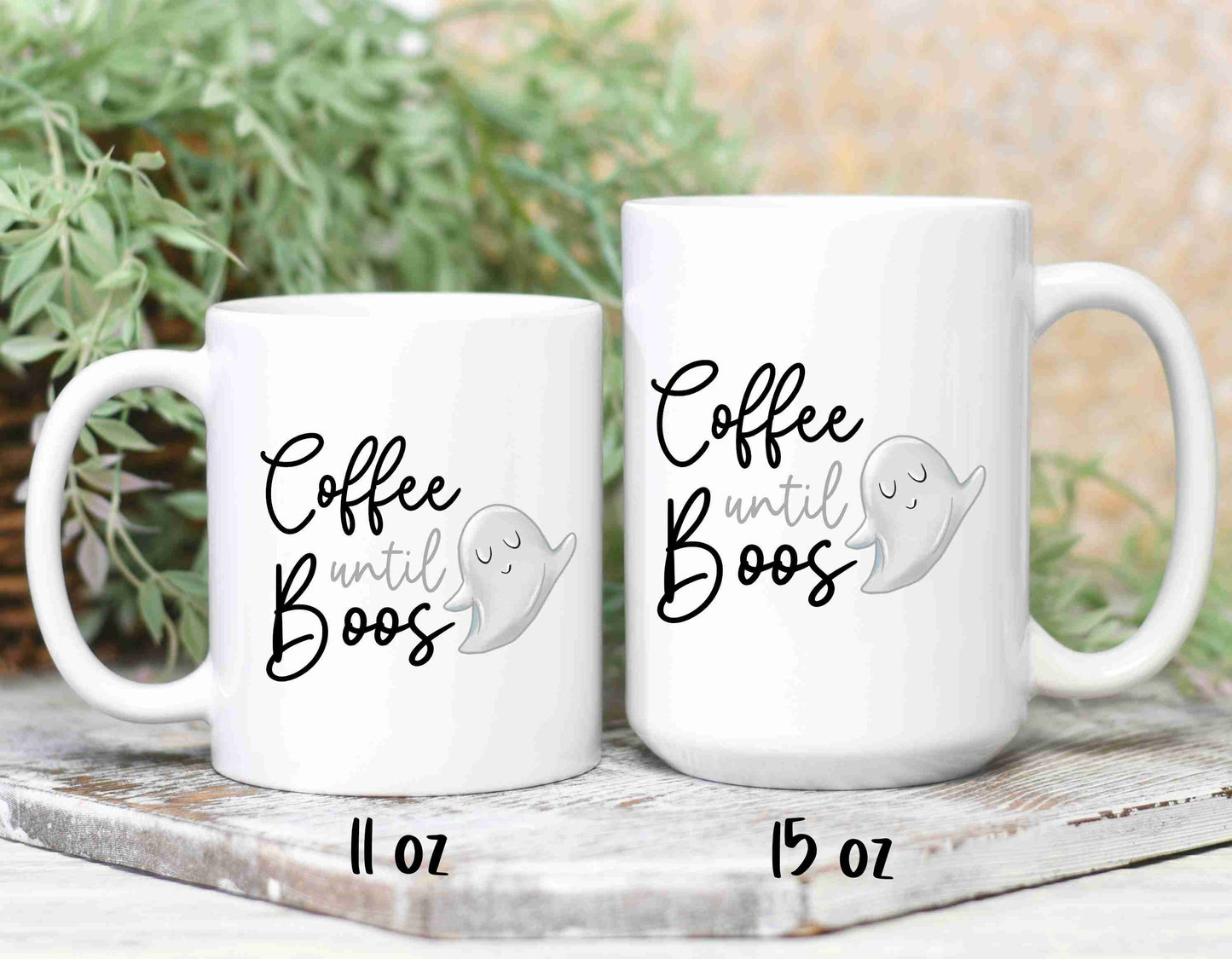 Two sizes of coffee mugs that read coffee until boos in a script font with a cartoon ghost beside it.