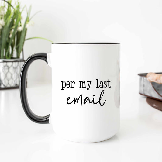 A witty coffee mug that reads 'per my last email'